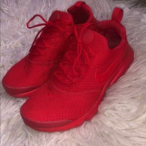 All red nike tennis shoes